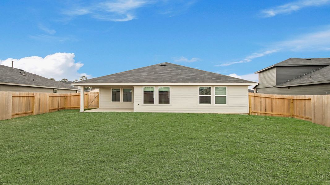 Exterior details and patio area of a home in Grand Pines, Magnolia (Image 4).
