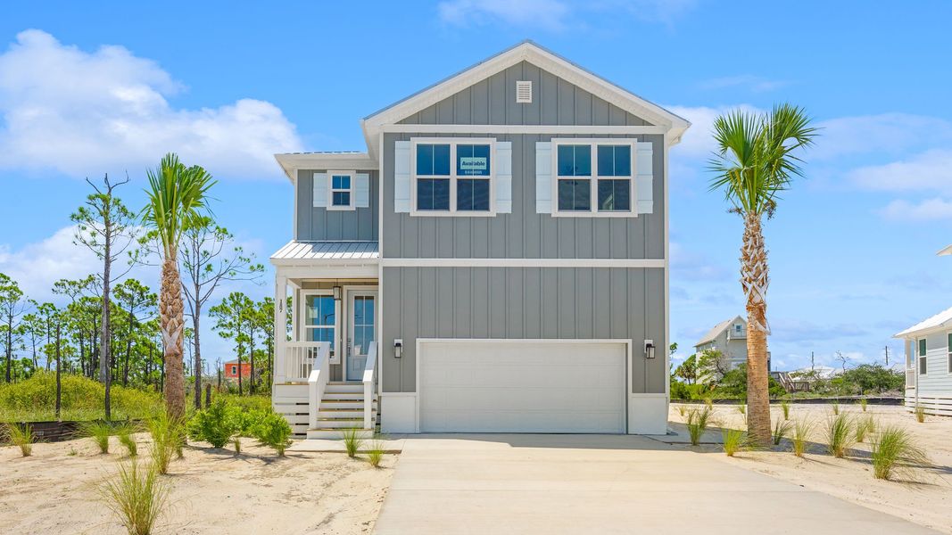 Front exterior of a new home in Redfish Cove at Cape San Blas, Port Saint Joe, FL, highlighting curb appeal (Image 2). Front exterior of a new home in Redfish Cove at Cape San Blas, Port Saint Joe, FL, highlighting curb appeal (Image 2).