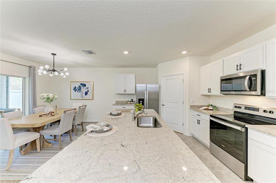 Furnished interior view inside a new home in Rye Crossing, Parrish (Image 13).