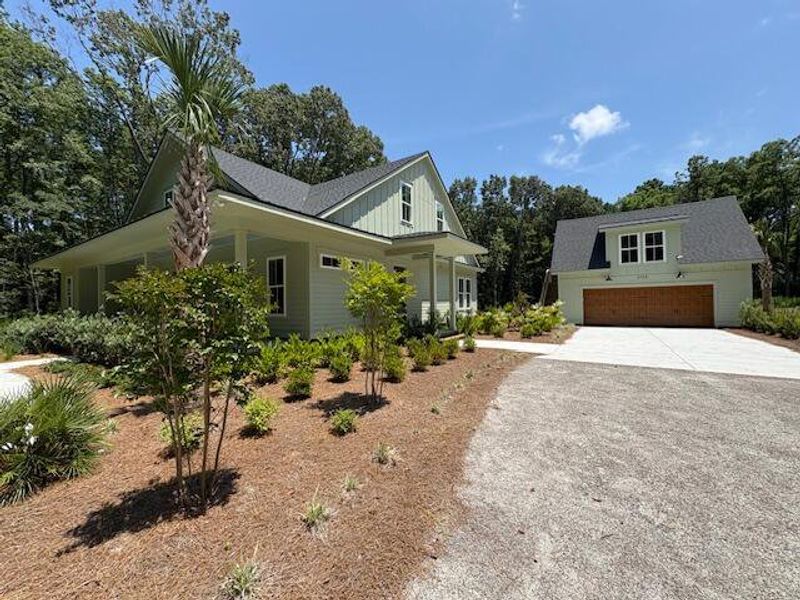 Front exterior of a new home in , Johns Island, SC, highlighting curb appeal (Image 24).