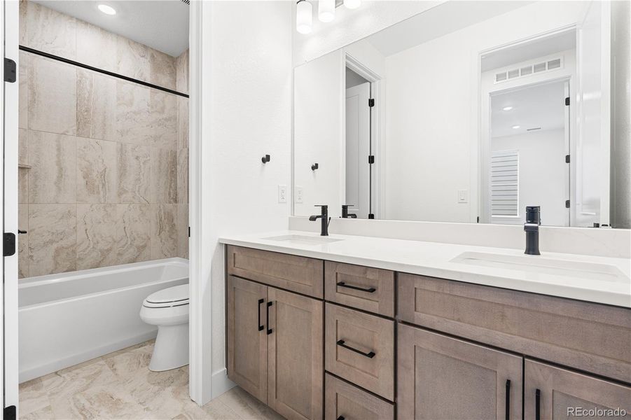 Furnished interior view inside a new home in Stargaze at Solstice, Littleton (Image 35).