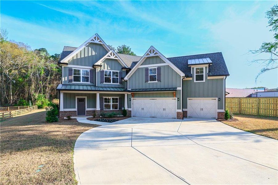 Front exterior of a new home in , Jefferson, GA, highlighting curb appeal (Image 28).