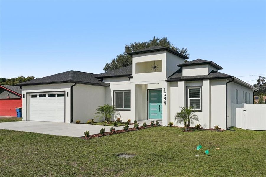 Front exterior of a new home in , Clearwater, FL, highlighting curb appeal (Image 28). Front exterior of a new home in , Clearwater, FL, highlighting curb appeal (Image 28).