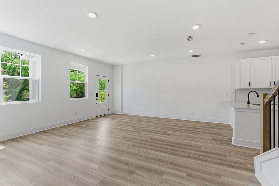 A large empty kitchen. A large empty kitchen.