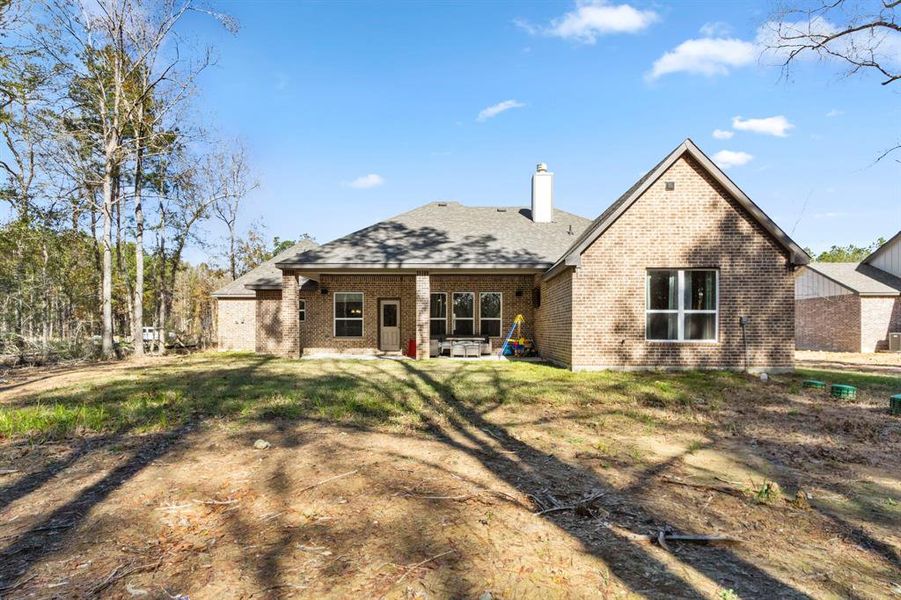 Notice the brick on the back side of the property as well - 4 sided brick home.