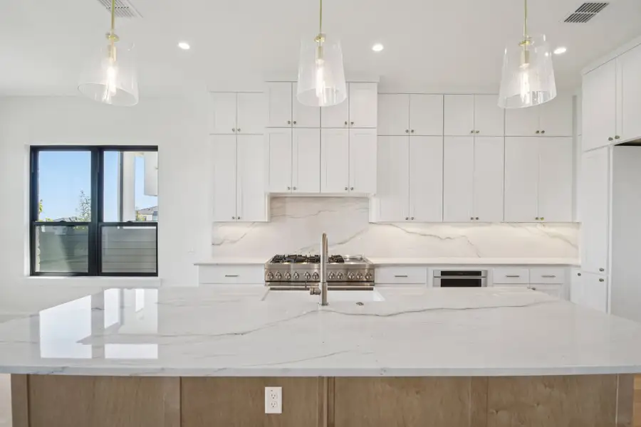 Furnished interior view inside a new home in Milky Way at River Place, Austin (Image 8).