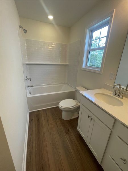 Furnished interior view inside a new home in Springwood Grove, Central (Image 7).