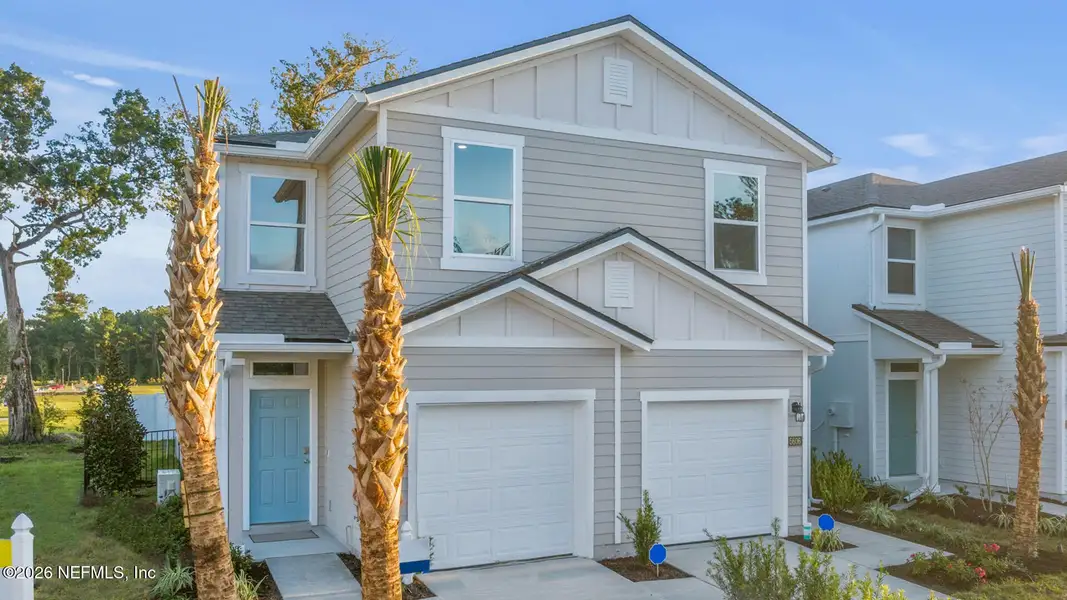 Front exterior of a new home in Hansen Creek, Jacksonville, FL, highlighting curb appeal (Image 2).
