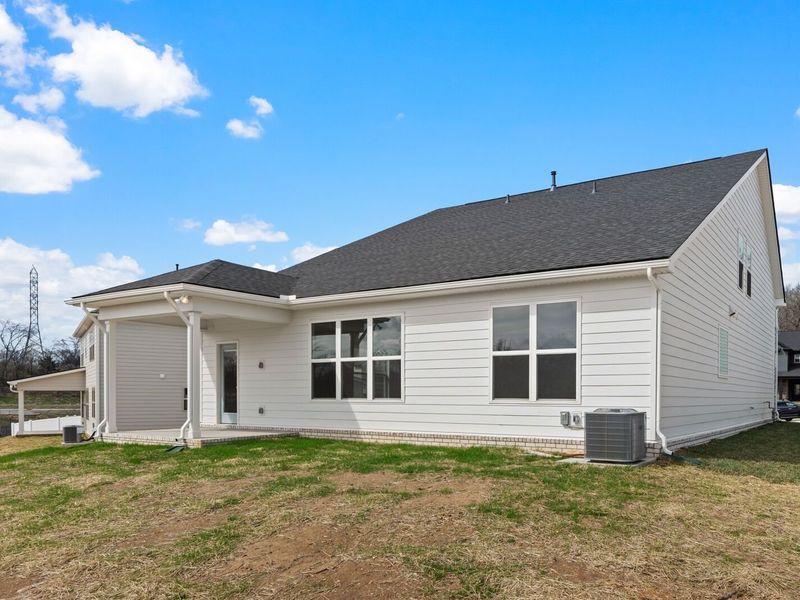 Exterior details and patio area of a home in Woods Crossing, Gallatin (Image 33).