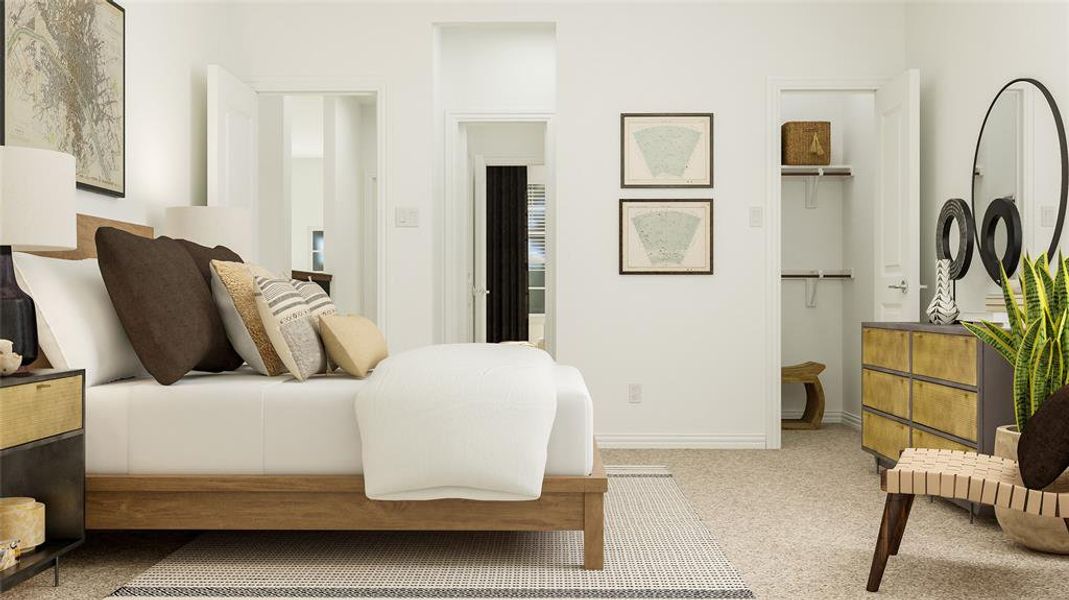 Bedroom featuring carpet floors, a closet, and a spacious closet