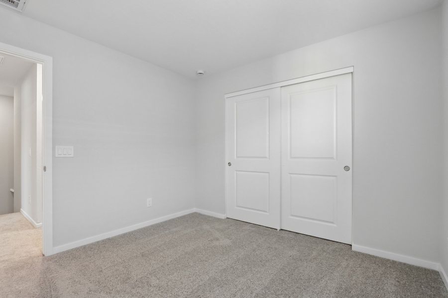 A room with white doors.