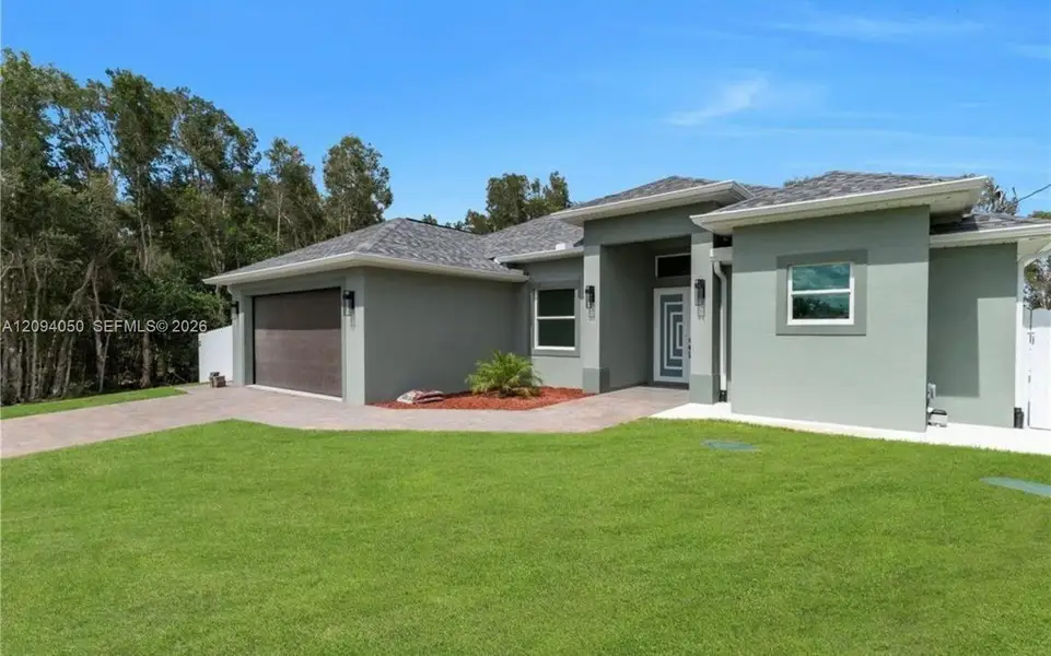 Exterior details and patio area of a home in , Lehigh Acres (Image 3).
