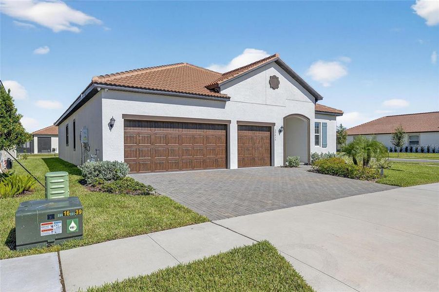Front exterior of a new home in , Wimauma, FL, highlighting curb appeal (Image 28).