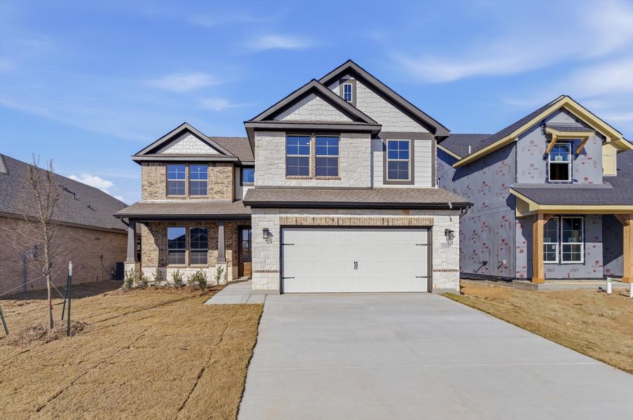 Front exterior of a new home in Liberty Pointe, Gainesville, TX, highlighting curb appeal (Image 2). Front exterior of a new home in Liberty Pointe, Gainesville, TX, highlighting curb appeal (Image 2).