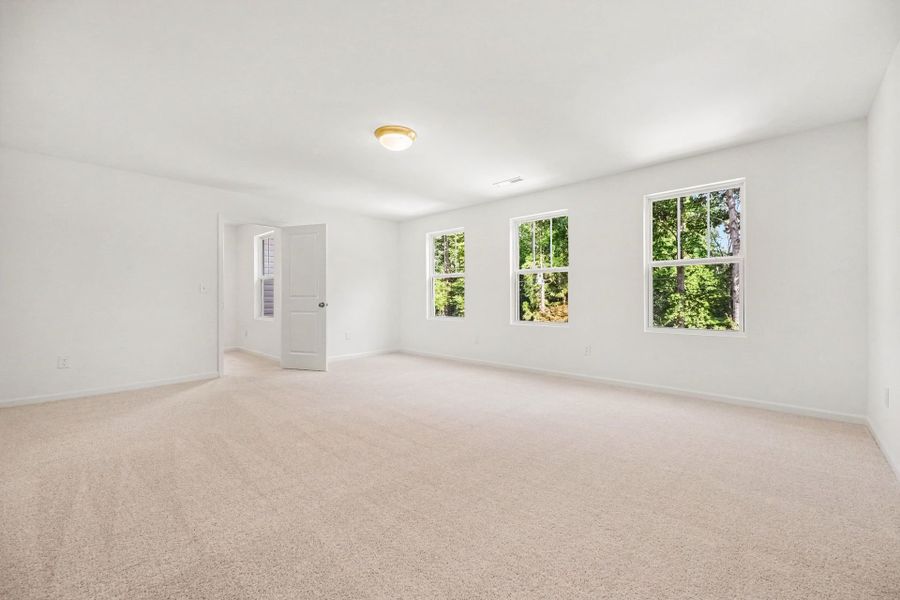 Spacious, unfurnished interior of a new home in Lake Royale, Louisburg (Image 16).