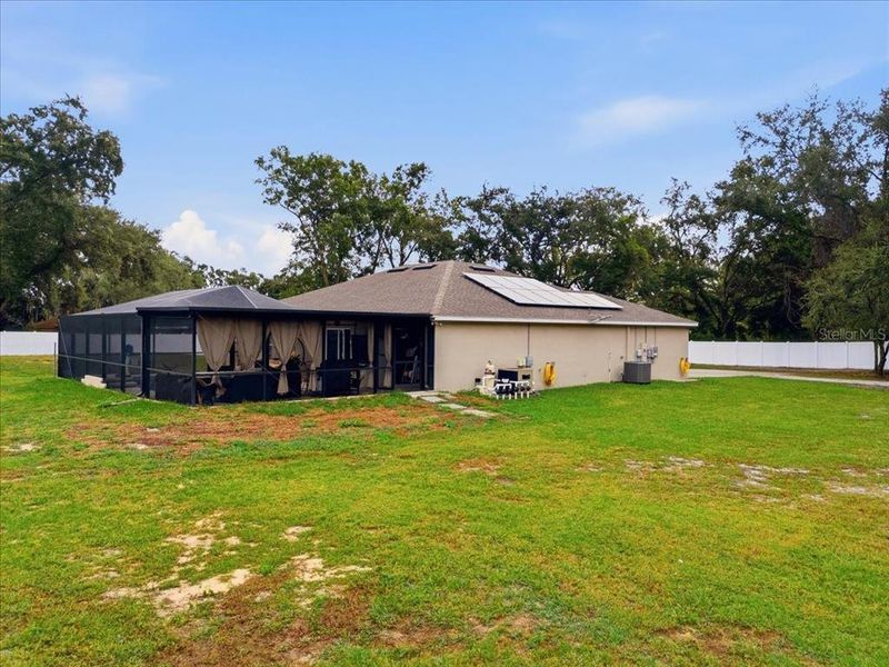 Exterior details and patio area of a home in , Auburndale (Image 32).