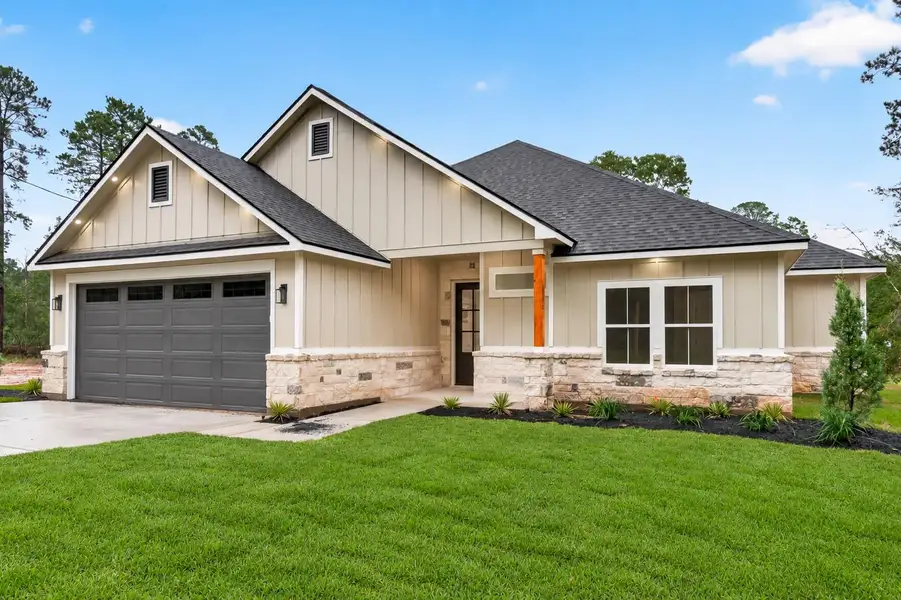 Front exterior of a new home in , Plantersville, TX, highlighting curb appeal (Image 2). Front exterior of a new home in , Plantersville, TX, highlighting curb appeal (Image 2).