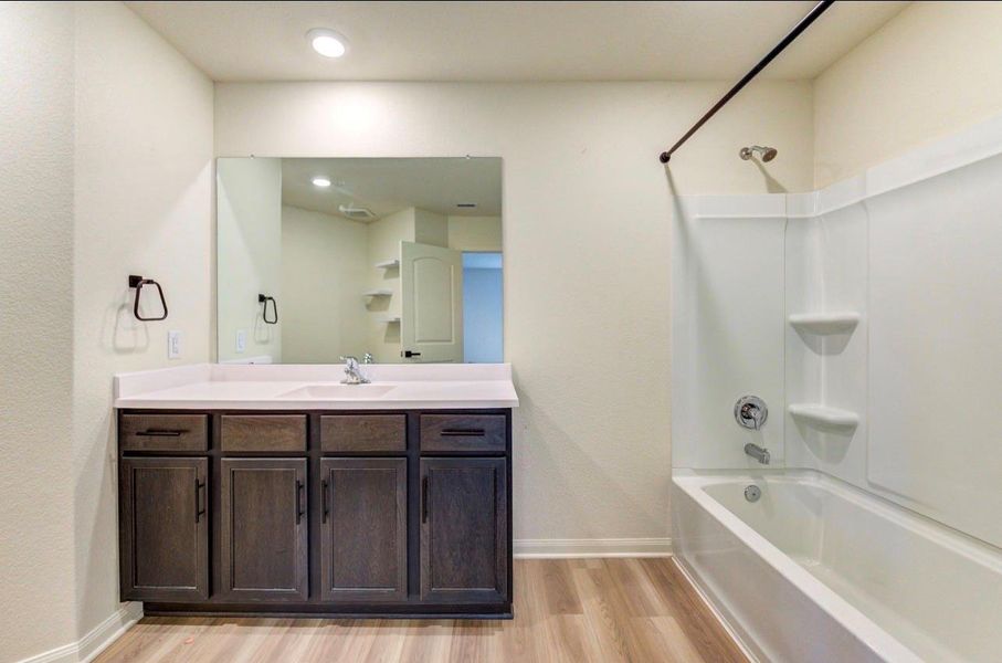 Furnished interior view inside a new home in Williams Trace, Magnolia (Image 11).