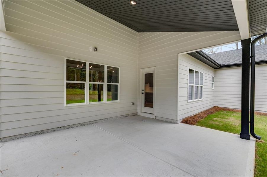 Front exterior of a new home in Liberty Station, Bremen, GA, highlighting curb appeal (Image 1).