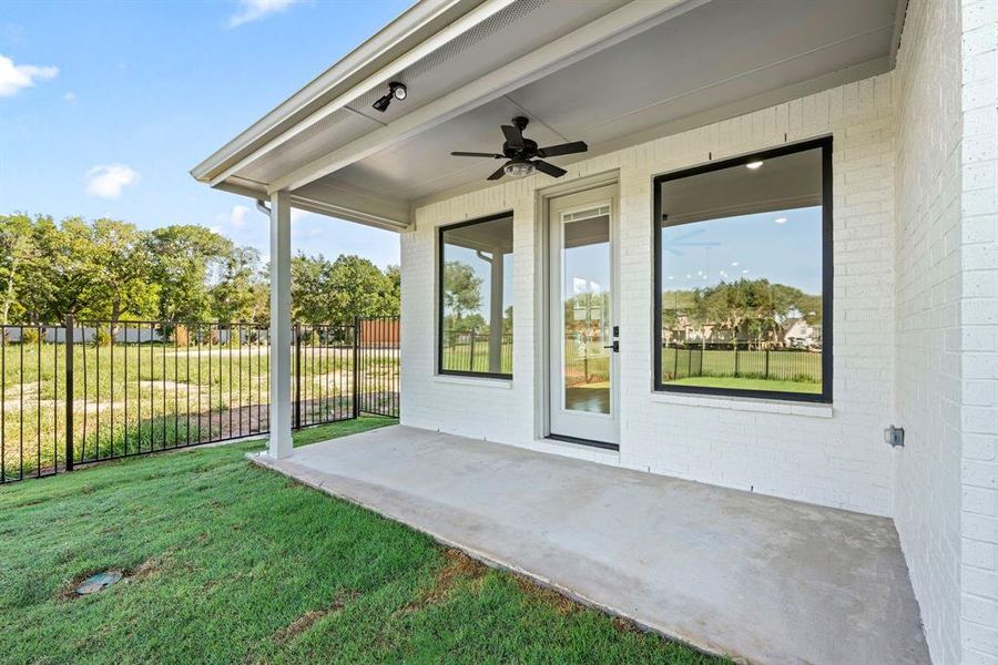 Front exterior of a new home in The Resort on Eagle Mt. Lake, Fort Worth, TX, highlighting curb appeal (Image 16). Front exterior of a new home in The Resort on Eagle Mt. Lake, Fort Worth, TX, highlighting curb appeal (Image 16).