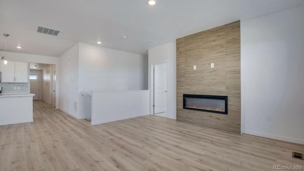 Spacious, unfurnished interior of a new home in Trails at Crowfoot, Parker (Image 29).