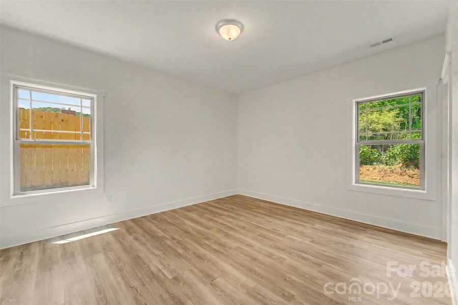 Spacious, unfurnished interior of a new home in , Waynesville (Image 11).