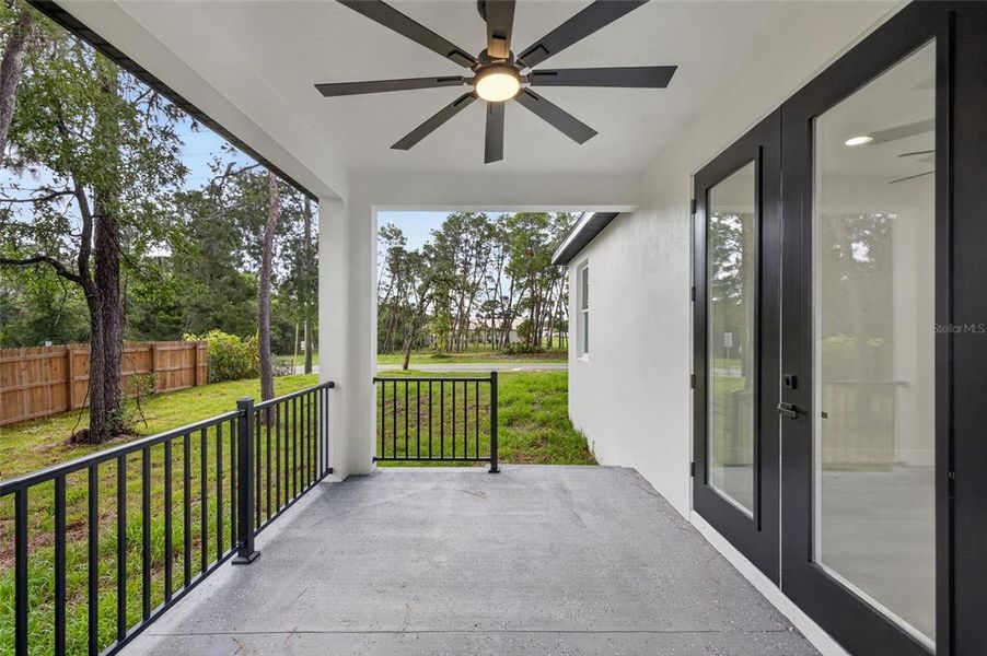 Exterior details and patio area of a home in , Spring Hill (Image 35).