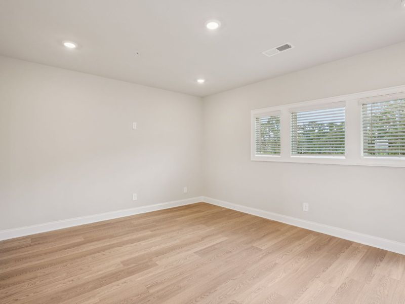 Spacious, unfurnished interior of a new home in Hemingway - Highland Series, Cumming (Image 13).