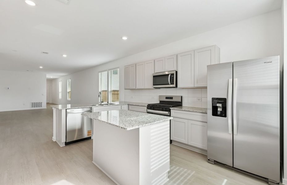 Furnished interior view inside a new home in Mavera, Conroe (Image 11).