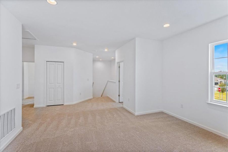 Spacious, unfurnished interior of a new home in Serenade at Ovation, Winter Garden (Image 14). Spacious, unfurnished interior of a new home in Serenade at Ovation, Winter Garden (Image 14).