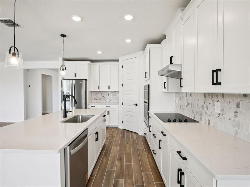 Furnished interior view inside a new home in Two Rivers - Signature Series, Zephyrhills (Image 7). Furnished interior view inside a new home in Two Rivers - Signature Series, Zephyrhills (Image 7).