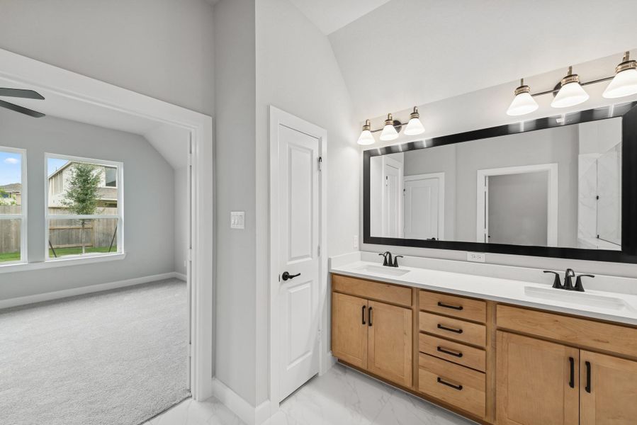 Furnished interior view inside a new home in Meridiana 55' Homesites, Manvel (Image 9).