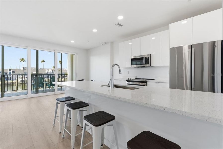 Furnished interior view inside a new home in Residences at Town Center, Madeira Beach (Image 19).