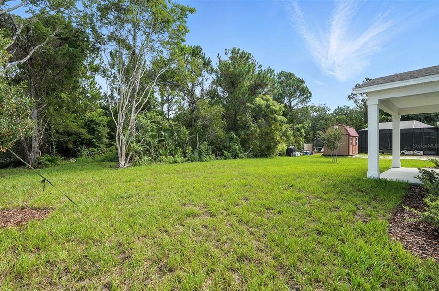 Front exterior of a new home in Palm Coast Homes, Palm Coast, FL, highlighting curb appeal (Image 23).
