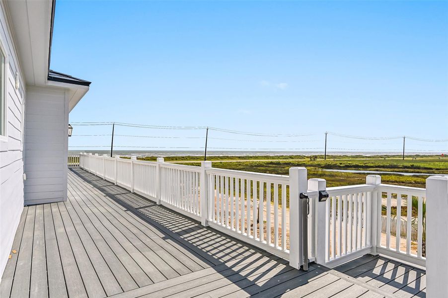 Unobstructed Gulf views stretch endlessly from this elevated porch, creating the ultimate beachside escape. Every sunrise and sunset becomes part of your everyday lifestyle.