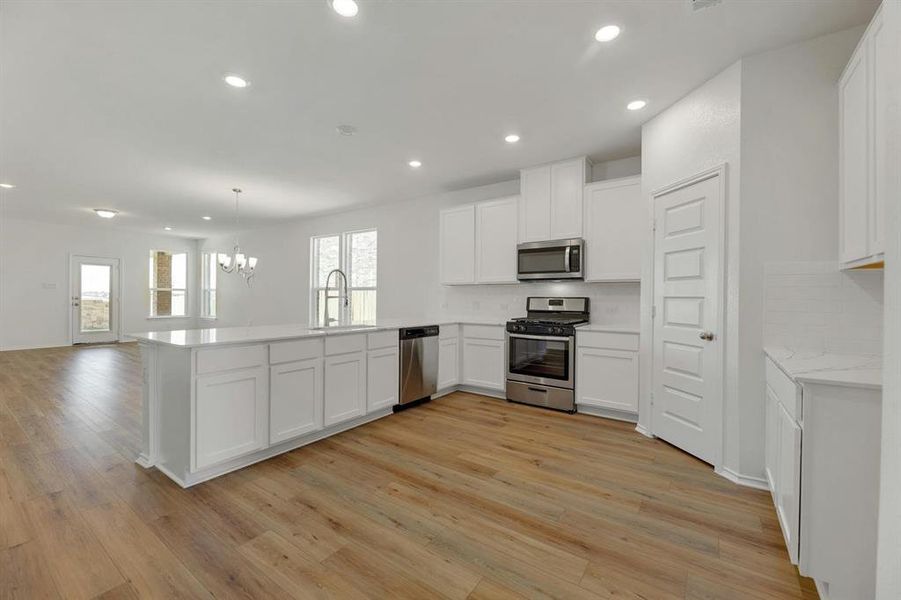 This kitchen is a very timeless and inviting space.