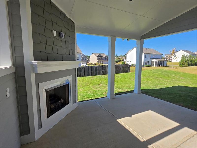 Exterior details and patio area of a home in Enclave at Logan Point, Loganville (Image 3).
