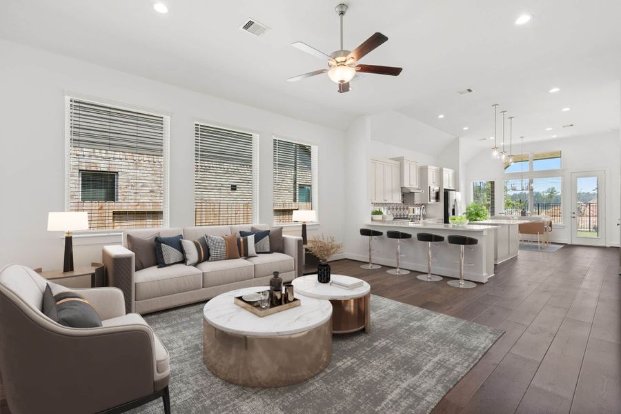Representative furnished interior of a home built from the Marion by Chesmar Homes in Sunterra, Katy (Image 1).