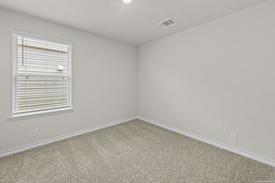 Spacious, unfurnished interior of a new home in Brookstone Creek, San Antonio (Image 30).