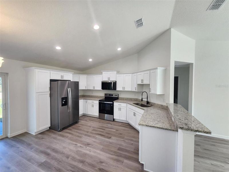 Furnished interior view inside a new home in , Dunnellon (Image 5).