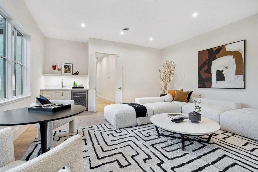 Designed for both fun and function, the enclosed game room features full doors for privacy and a dedicated beverage station—the spacious game room with full-height doors offers a private retreat for entertaining or relaxation, ideal for hosting movie nights, sleepovers, game days, or casual gatherings. Designed for both fun and function, the enclosed game room features full doors for privacy and a dedicated beverage station—the spacious game room with full-height doors offers a private retreat for entertaining or relaxation, ideal for hosting movie nights, sleepovers, game days, or casual gatherings.