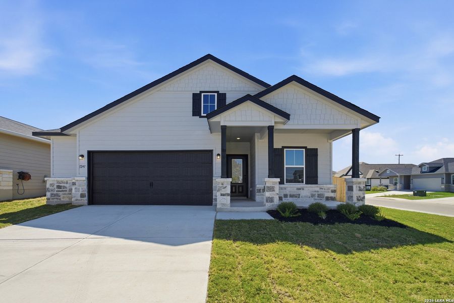 Front exterior of a new home in Swenson Heights, Seguin, TX, highlighting curb appeal (Image 2).