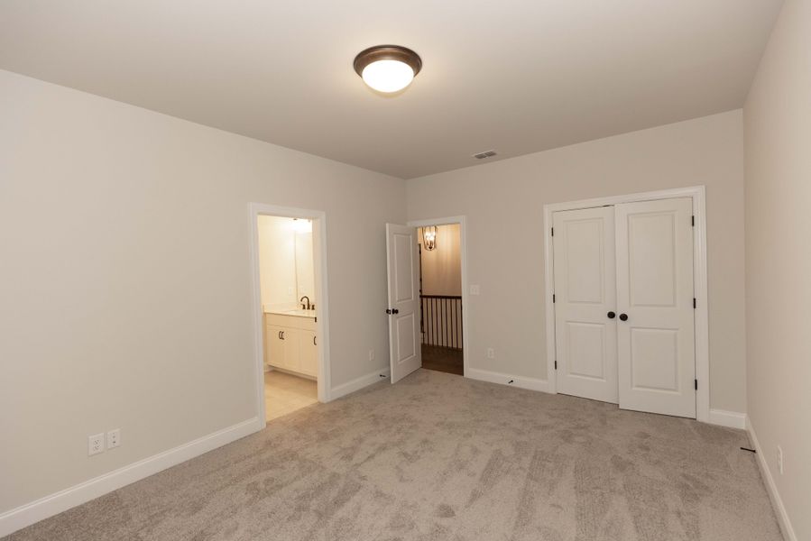 Representative unfurnished interior of a home built from the The Tensley by The Providence Group in Waterhaven, Cumming (Image 36).
