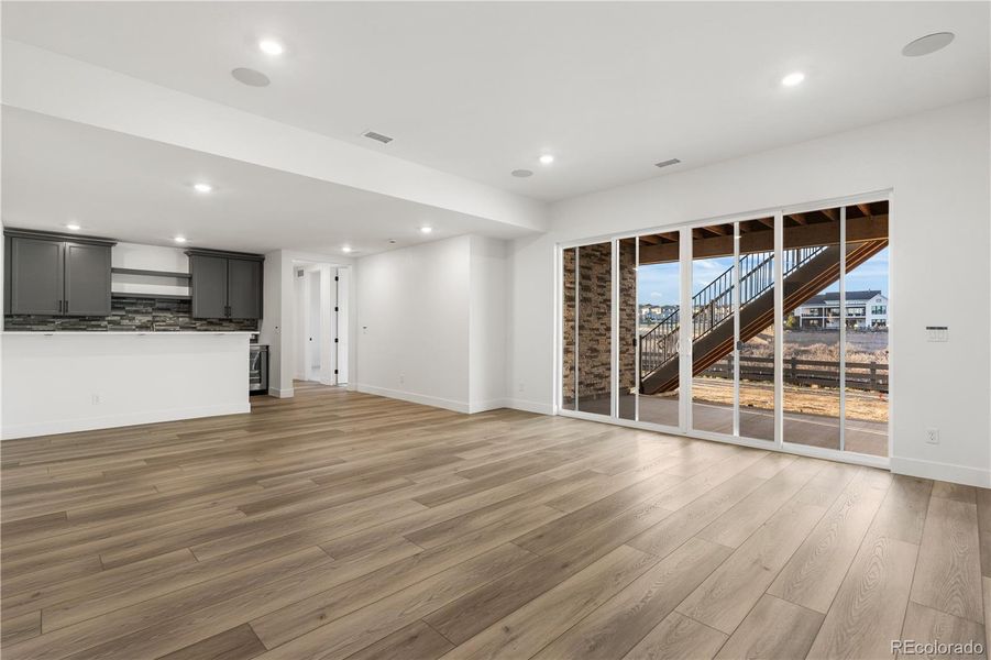 Spacious, unfurnished interior of a new home in Luxe at The Canyons, Castle Pines (Image 43).
