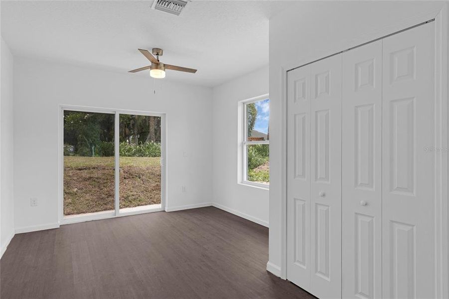 Slider doors leading to the back yard * windows throughout the house for a nice open feel