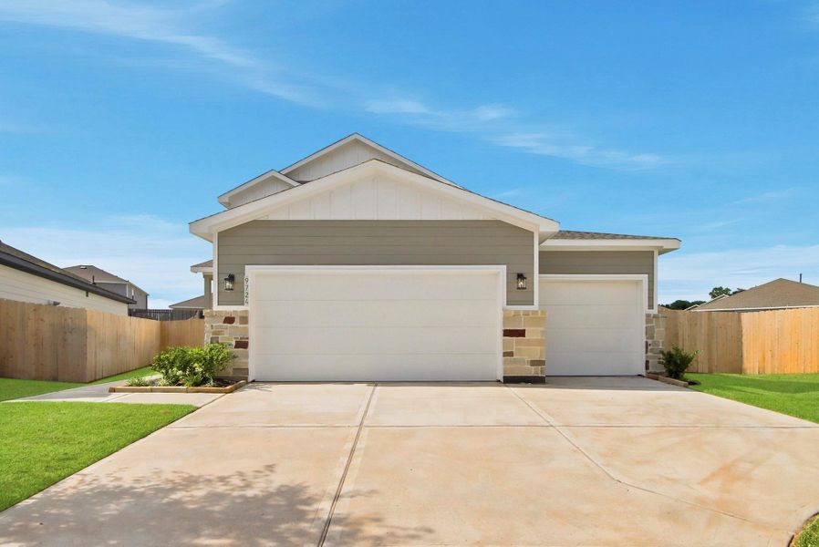 Front exterior of a new home in Caney Mills, Conroe, TX, highlighting curb appeal (Image 1). Front exterior of a new home in Caney Mills, Conroe, TX, highlighting curb appeal (Image 1).