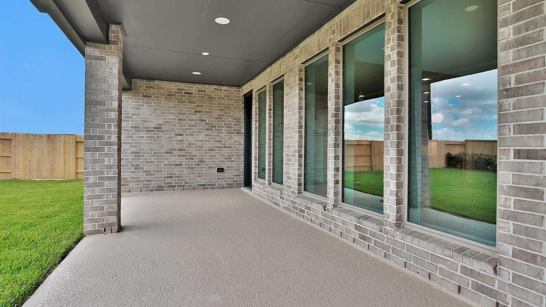 Exterior details and patio area of a home in Legacy Prairie at Katy Court, Katy (Image 2).
