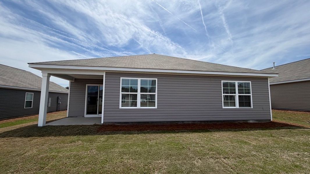 Exterior details and patio area of a home in Gates Village, Lugoff (Image 3).