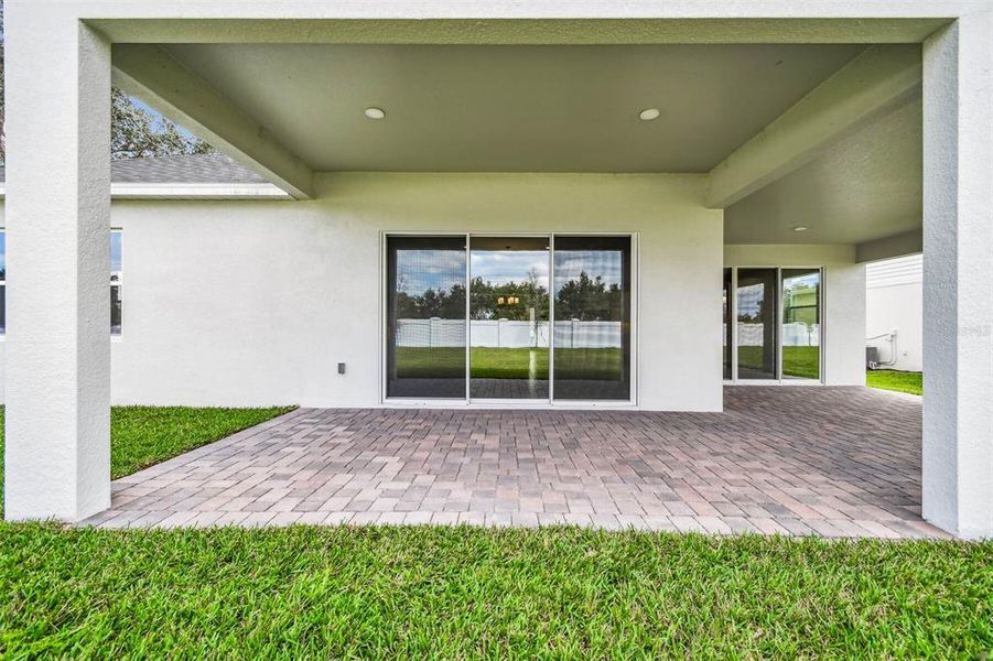 Exterior details and patio area of a home in Solace at Corner Lake, Orlando (Image 3).