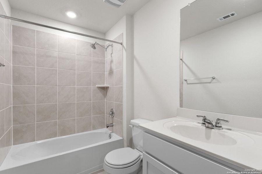 Furnished interior view inside a new home in Brookstone Creek, San Antonio (Image 11).